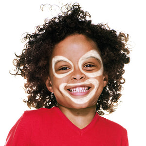 Step one, Using a brush to draw large, irregular white circles around each eye and thick irregular white lines around the mouth.