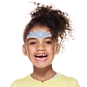 Step two, using white face paint, adding outline to the triangles in the top and bottom. Draw a star in the middle of crown shape and add five sets of three short lines along the bottom outline followed by three lines in between the eyebrows.