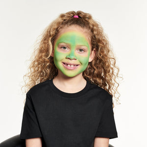 Step one, showing the start of covering whole face with lime green face paint, avoiding mouth and eyes.