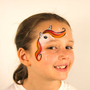Final step, adding eyes, ears, and sparkles to complete the Splitcake Unicorn face paint.