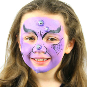 Final step, adding eyebrows, spiders, and cobwebs using black to complete Purple Warty Witch face paint look.
