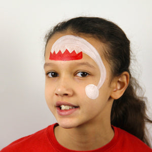 To start your Elf, paint the hat on the forehead using red and white paint and don't forget the bobble at the end!