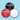 Three Snazaroo face paint pots in black, bright red, and white on a light blue background.