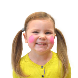 Step one, showing the start of creating two pink circles onto the cheeks.