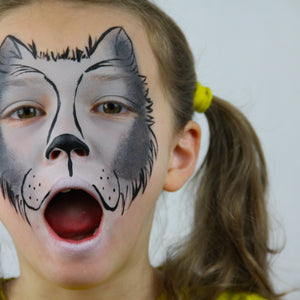 Step two, Using black face paint, add the nose and outline to create fur of wolf.