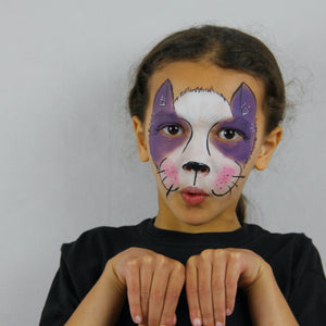 Final step, adding pink nose and black highlights to complete the Halloween Cat face paint.