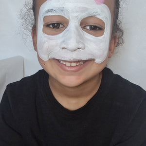 Step one, Creating the panda face shape with white, leaving holes for the eyes, and filling in. Adding small pink circles for the inner ears.