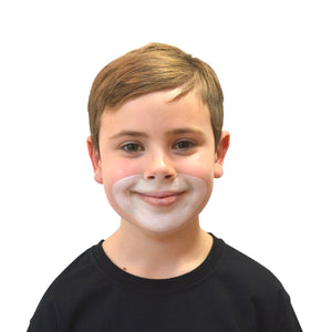 Step one, painting around the mouth and under the nose with white, filling it in using a sponge while avoiding the lips.