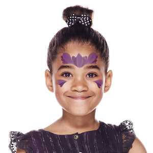 Step one, showing the start of creating princess crown with purple on the cheeks and forehead.