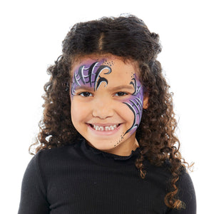 Final step, adding black and white web shape highlights to complete the Spider Girl face paint.