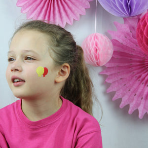 Step one, creating three balloons on the cheeks using red, yellow, and blue.