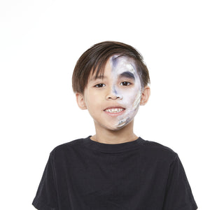 Step two, painting side of face with white and adding black and purple shading.