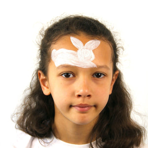 Step one, showing the start of creating bunny shape above forehead in white.