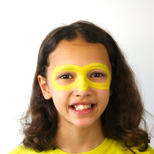 Step one, showing the start of creating bright yellow mask around eyes.
