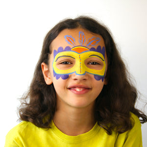 Final step, adding orange and pale blue highlights to complete Yellow Mask face paint.