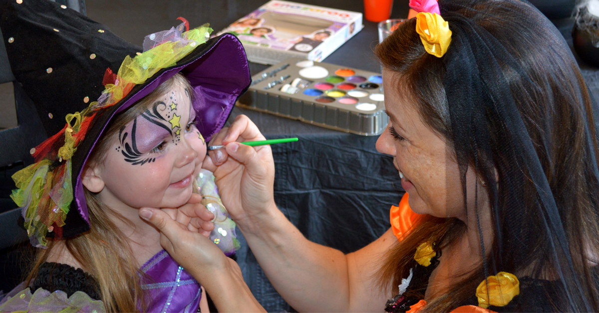 girl getting her face painted