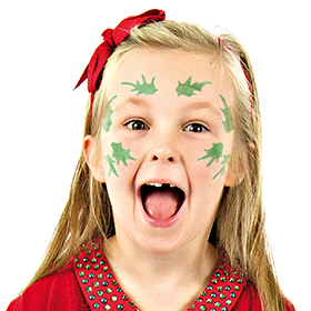 Girl with step 1 of Holly face paint design