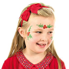 Girl with step 2 of Holly face paint design