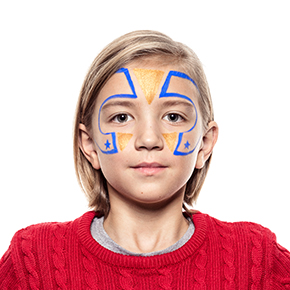 Boy with step 2 of Superhero face paint design