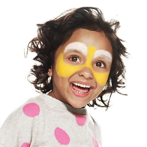 girl with step 1 of Bee face paint design