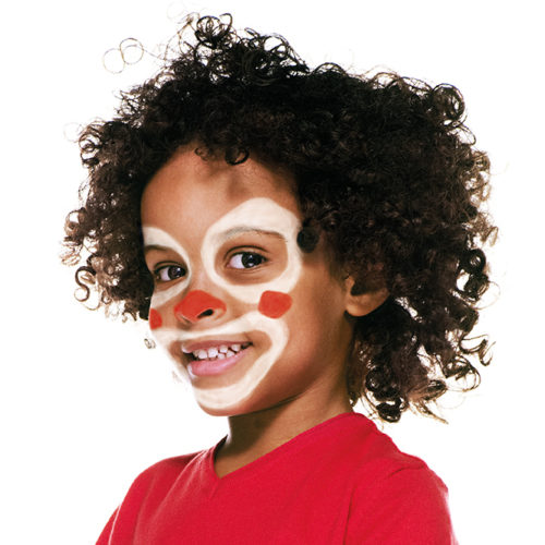 Boy with step 2 of Clown face paint design