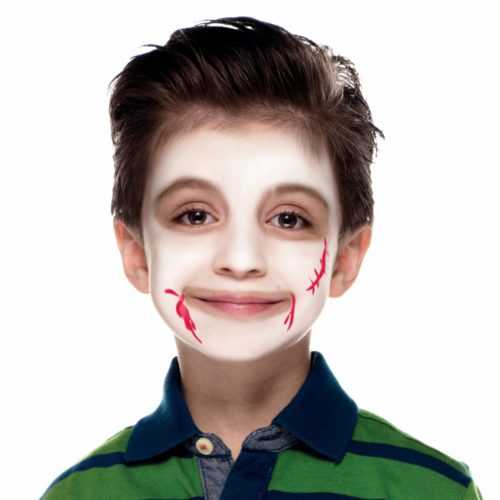 Boy with step 2 Vampire face paint design