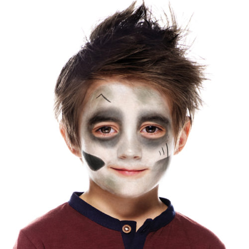 Boy with step 2 of Zombie face paint design