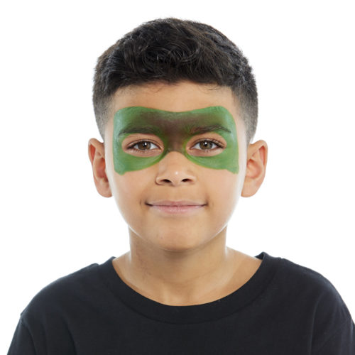 Boy with step 1 of Dinosaur face paint design