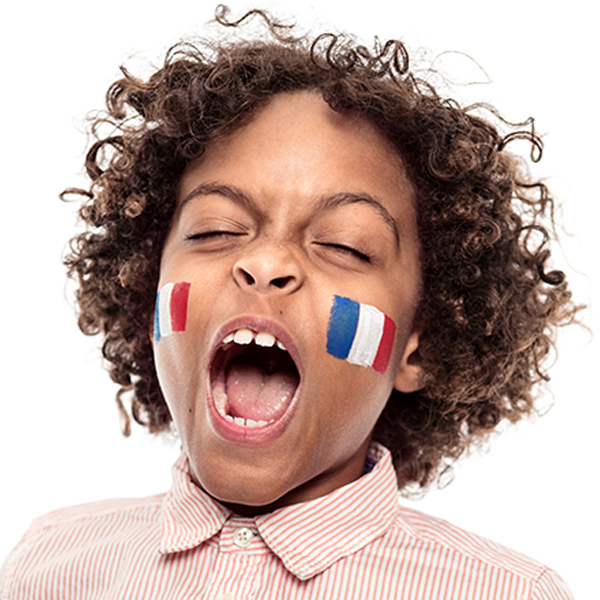 Boy with France flag face paint design