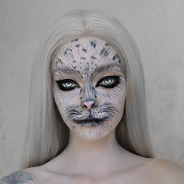girl with Snow Leopard paint design