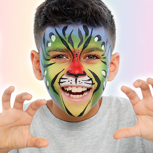 Boy with Rainbow Tiger Face Paint Banner